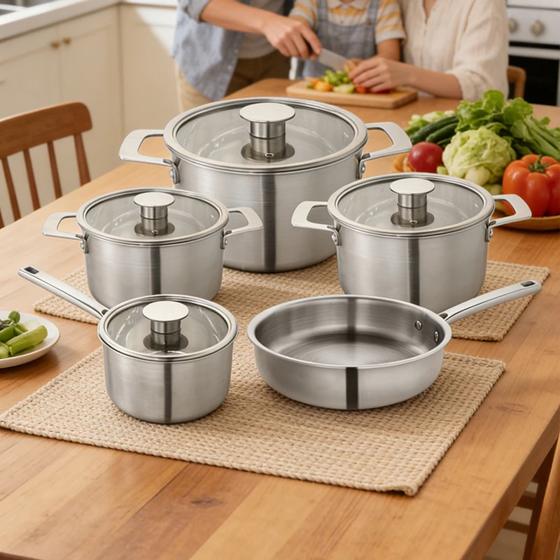 GS-01605-9PC tri-ply stainless steel cookware set in family kitchen scene