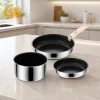 GS-01643-4PC tri-ply nonstick cookware set with one shared detachable handle in a modern kitchen