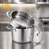 GS-01643-ST tri-ply stainless steel steamer pot and insert set in a commercial kitchen