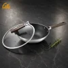 GS-01702-FP tri-ply titanium frying pan with glass lid, brown handle, and polished stainless steel exterior