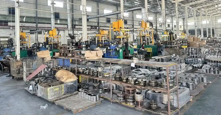 Goldensea Jiangmen cookware-forming workshop with hydraulic presses and work-in-progress components for supplier verification