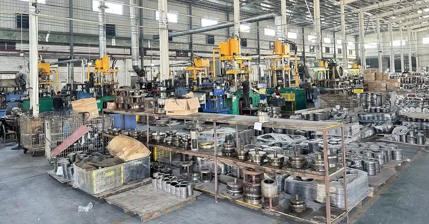 Goldensea Jiangmen cookware-forming workshop with hydraulic presses and work-in-progress components for supplier verification
