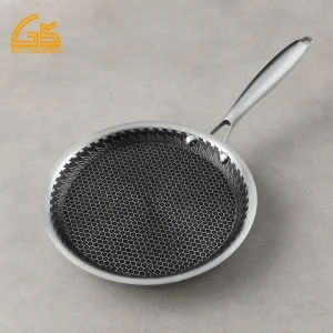 GS-01601EN-CP shallow stainless steel pizza pan and crepe pan with long handle on a gray studio surface