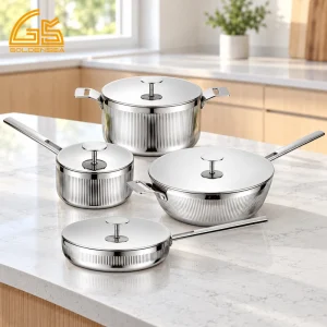 GS-01670-8PC eight-piece grooved stainless steel cookware set with four matching steel lids on a kitchen counter