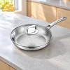 GS-01704-FP tri-ply titanium frying pan with hammered interior, glass lid and long handle on a kitchen counter