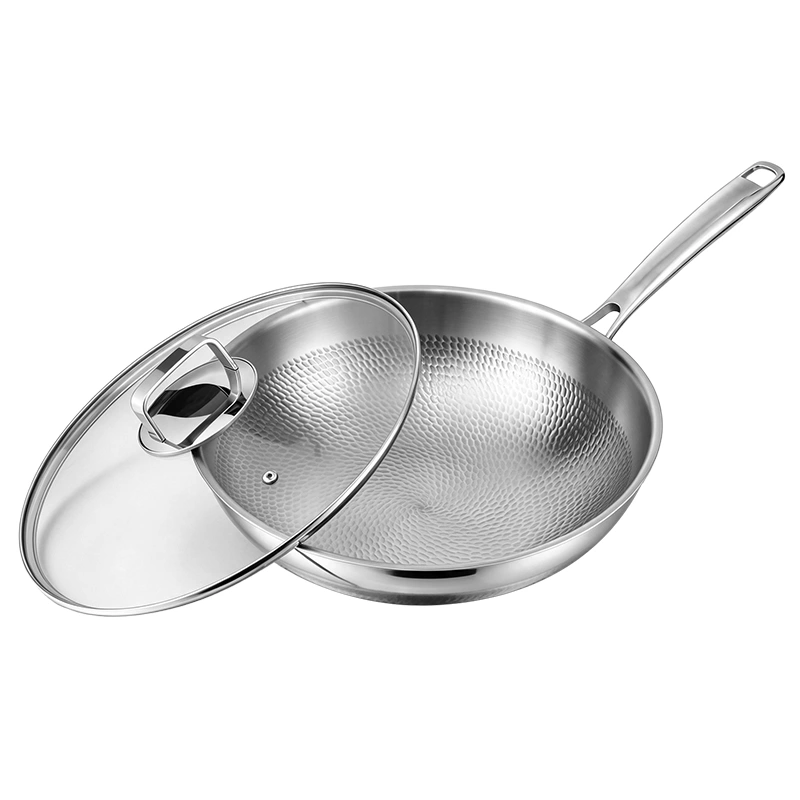 Open GS-01704-WK tri-ply titanium wok showing hammered interior with glass lid resting alongside